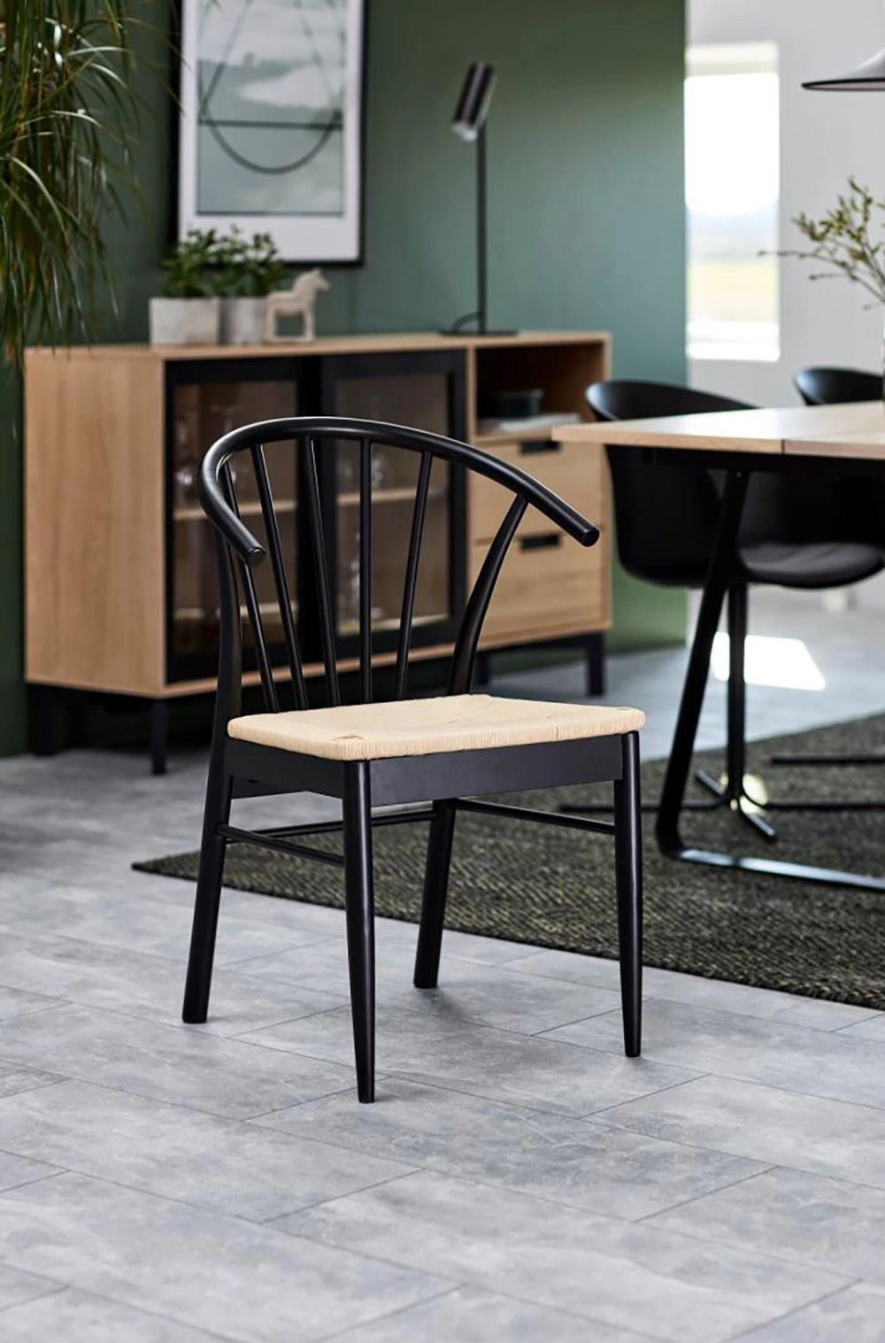 Sam Dining Chair Off in White Black Finish with Black Tub Chair and Wall Frame in Dining Setting