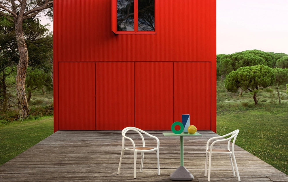 Soul Dining Chair with Armrests in White Finish with Square Table and Loft House in Outdoor Setting