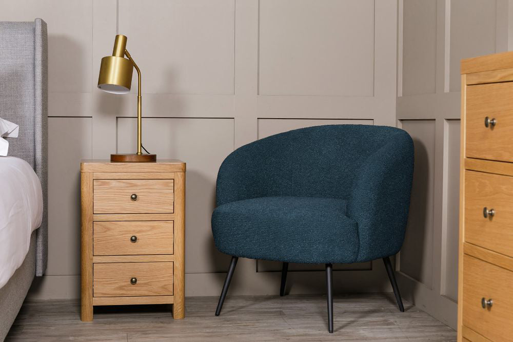 Spencer Accent Chair in Navy Finish with Side Table and Lampshade in Bedroom Setting