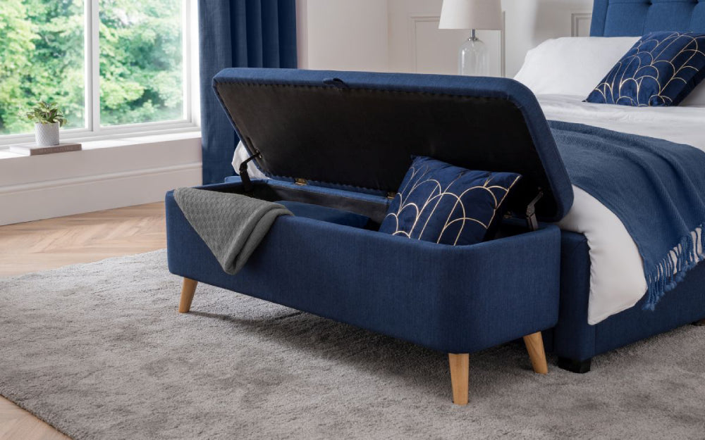Stellar Upholstered Blanket Box in Blue Finish with Throw and Lampshade in Bedroom Setting