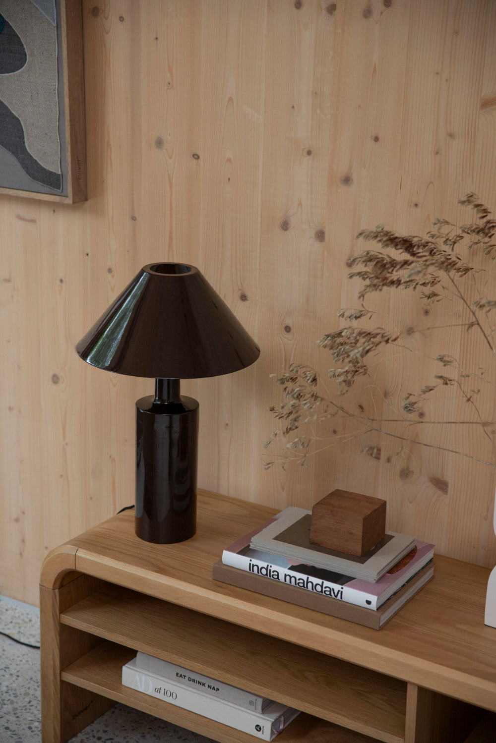 Teagan Wooden Media Unit with Lampshade and Books in Living Room Setting