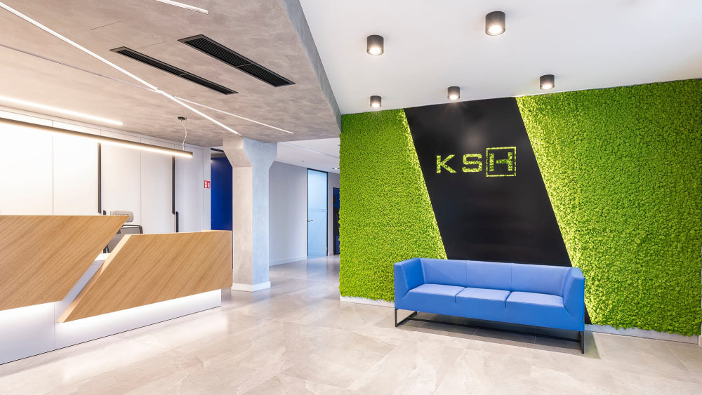 Verso Upholstered 3 Seater Sofa in Blue Finish with Reception Counter in Office Lobby Setting