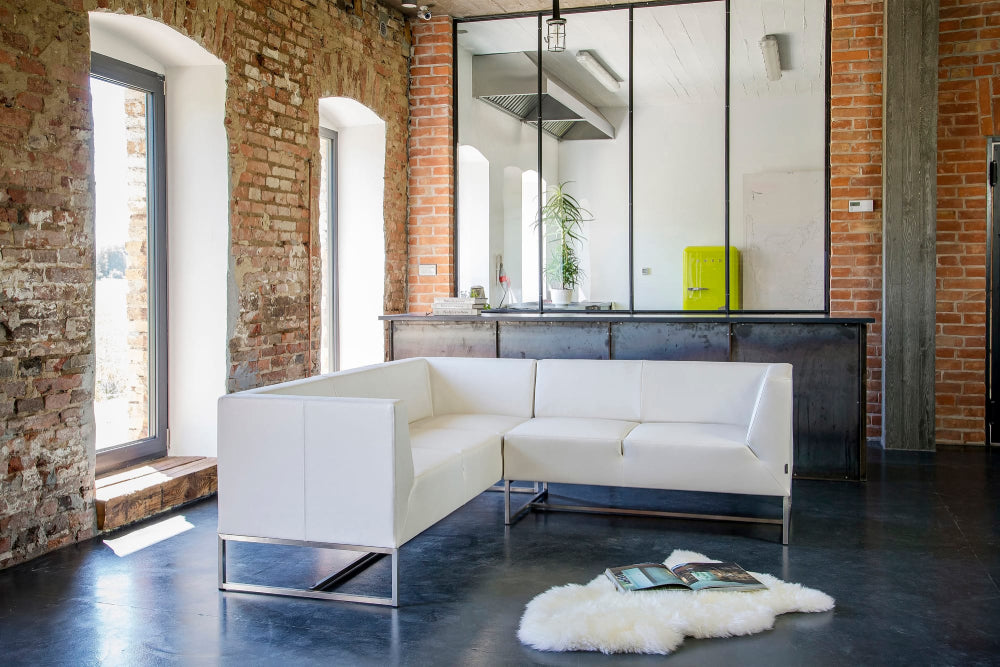 Verso Upholstered Modular Sofa in White Finish in Breakout Setting