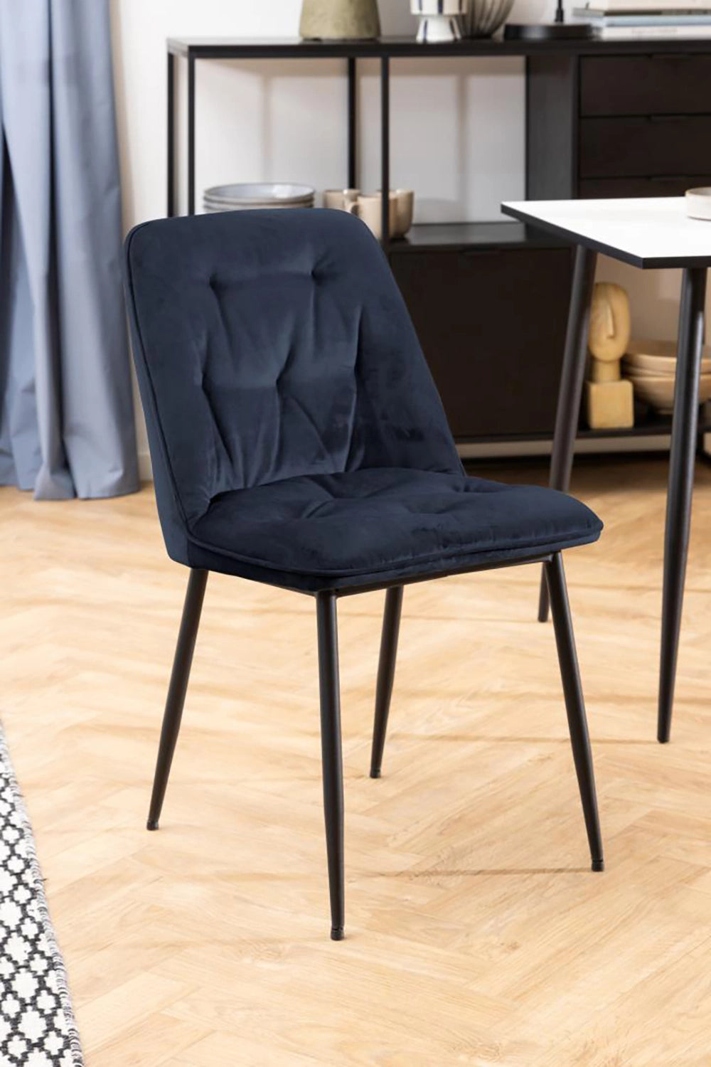Vicky Dining Chair in Midnight Blue Finish with White Top Table and Utensils in Dining Setting
