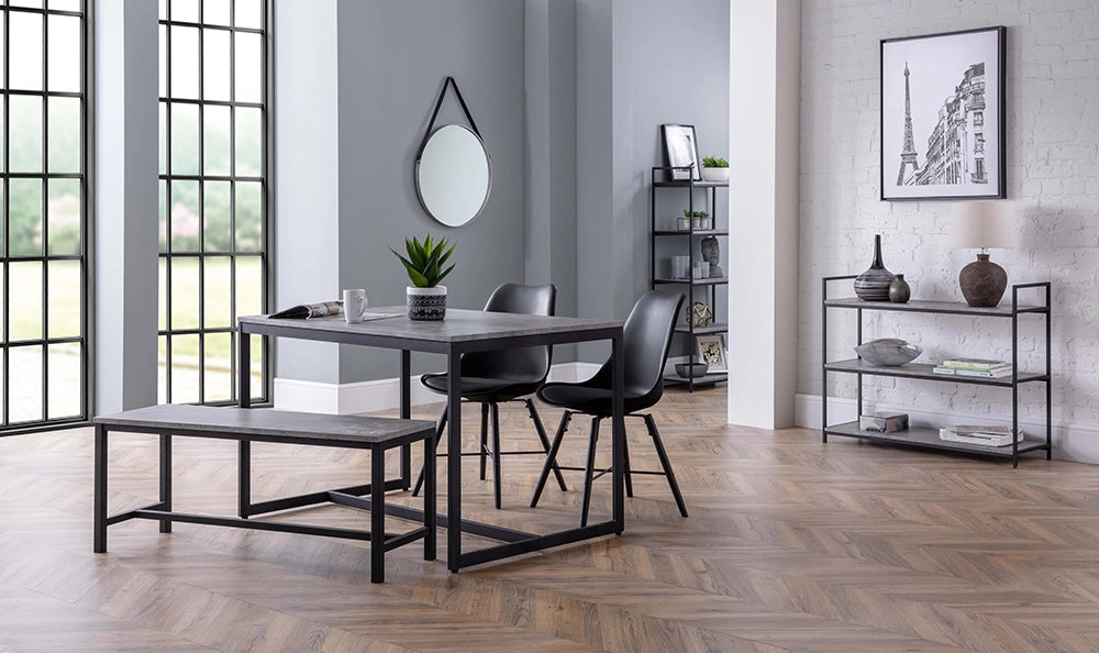 Adele Concrete Dining Table with Two Chairs and Round Wall Mirror in Breakout Setting