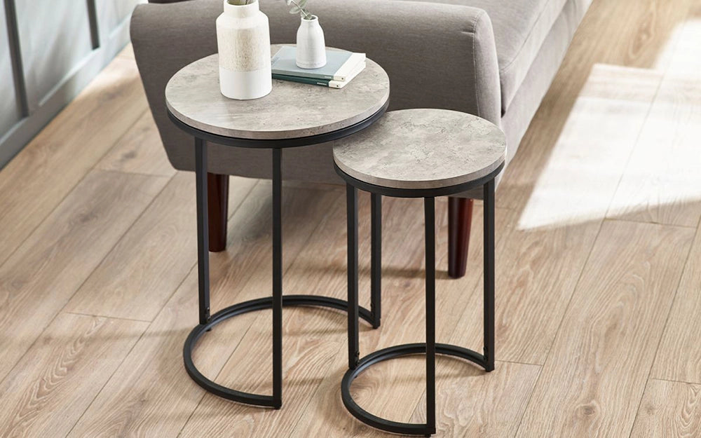 Adele Round Nesting Side Tables with Grey Sofa and White Vase in Living Room Setting