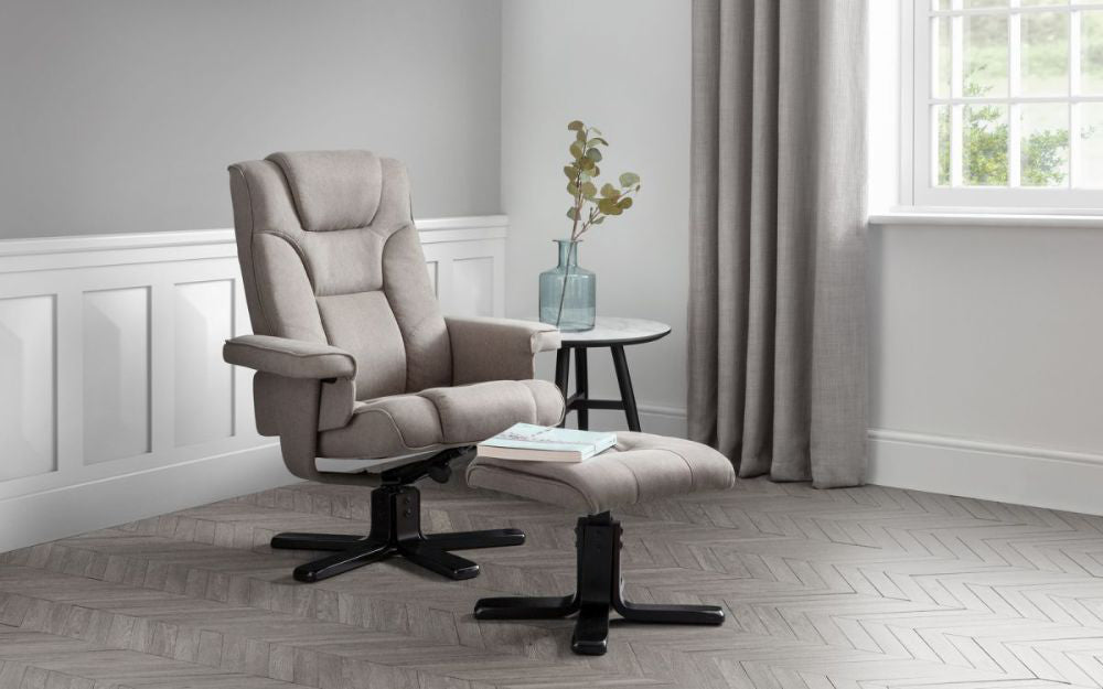 Ally Swivel Massage Recliner with Footstool Grey with Side Table and Vase in Living Room Setting