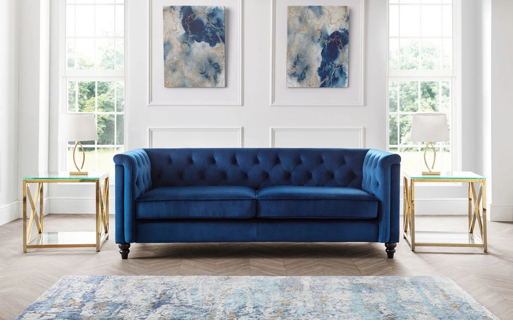 Andre Tufted 3-Seater Chair in Blue Velvet Finish with White Lamp Shade and Glass Top Table in Livng Room Setting