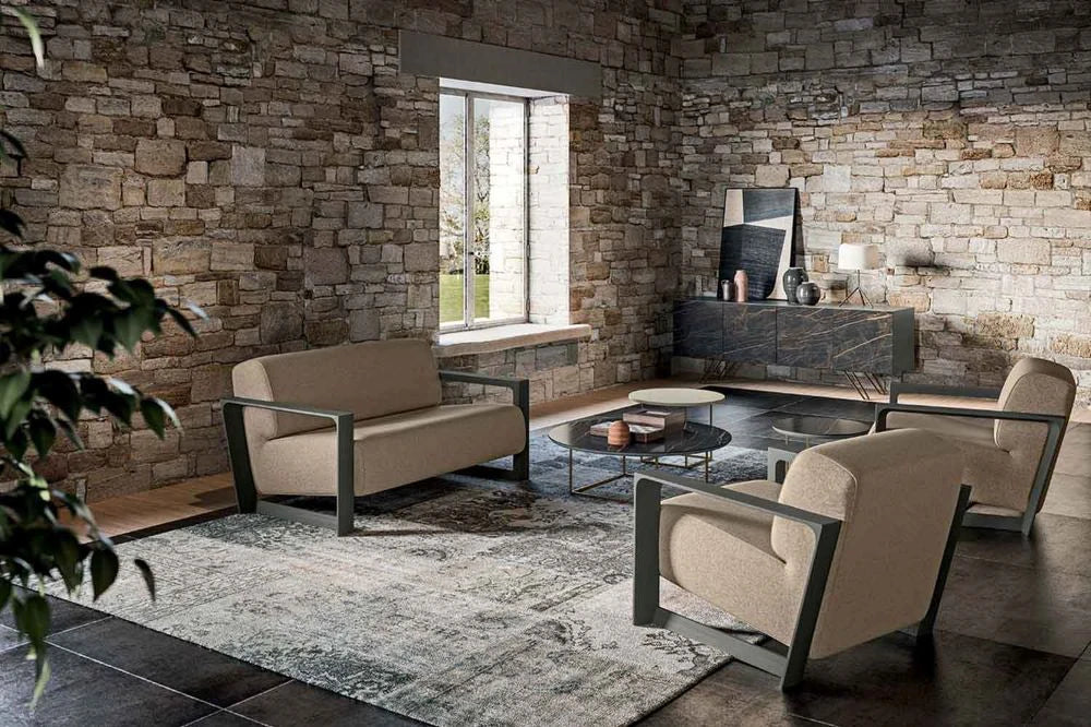 Arco Upholstered Armchair In Beige With Matching Sofa In Living Area Setting