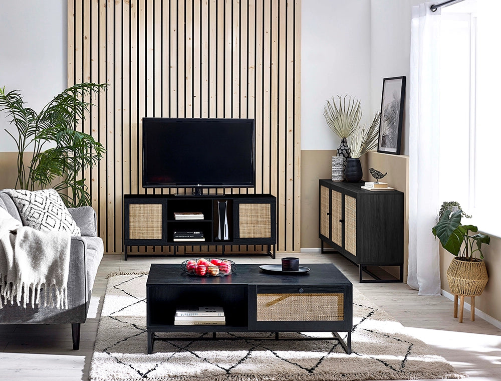 Bari Coffee Table in Black Finish with Upholstered Grey Sofa and Wall Frame in Living Room Setting