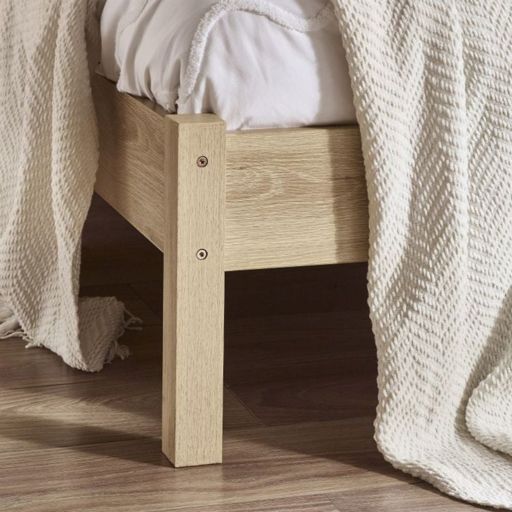 Bari Rattan Bed Frame Oak Leg Detail