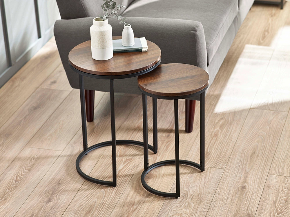 Beca Round Nesting Side Tables in Walnut Finish with Grey Sofa and White Vase in Living Room Setting
