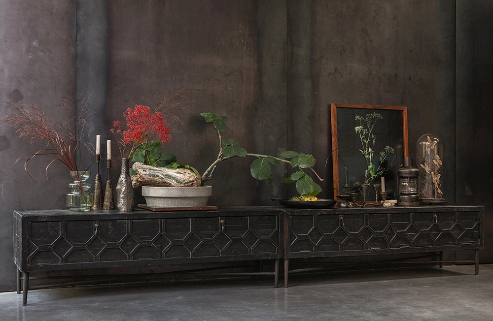 Bella TV Unit in Black Finish with Dried Plant and Antique Vase in Living Room Setting