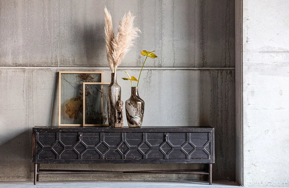 Bella TV Unit with Glass Vase and Indoor Plant in Living Room Setting