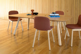 Blume Meeting Table with Office Chair and Various Books in Breakout Setting