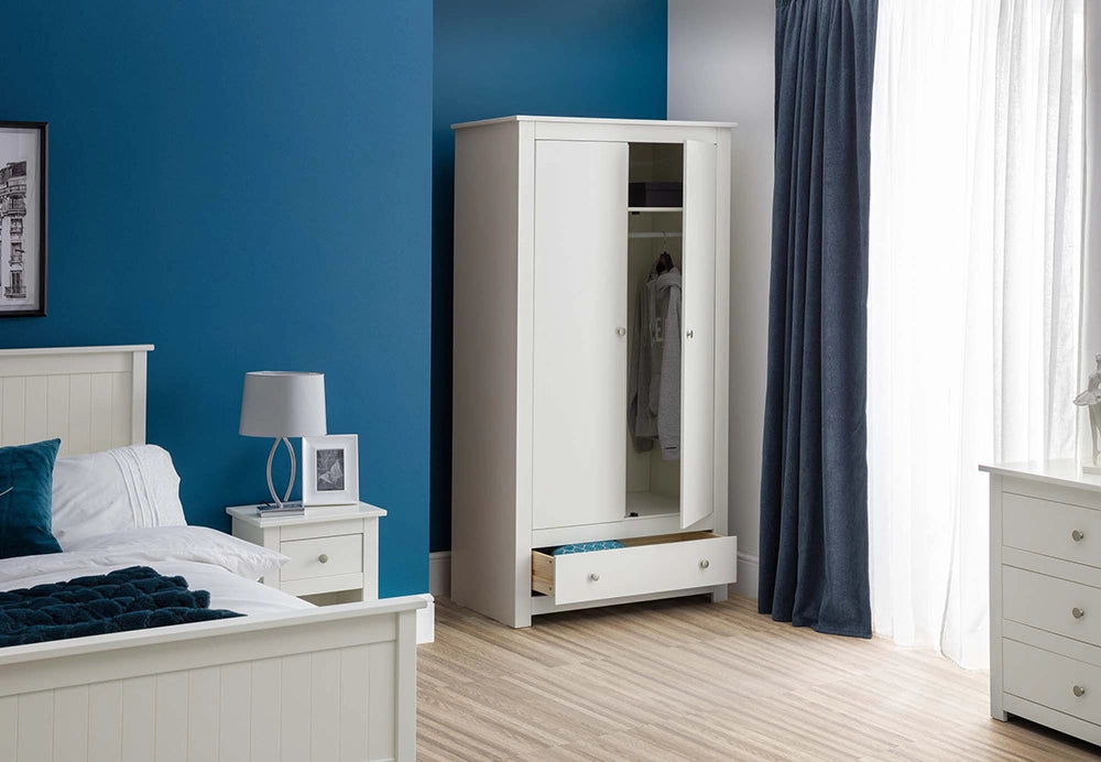 Bradley Wardrobe Surf in White Finish with Lampshade and Chest Drawer in Bedroom Setting