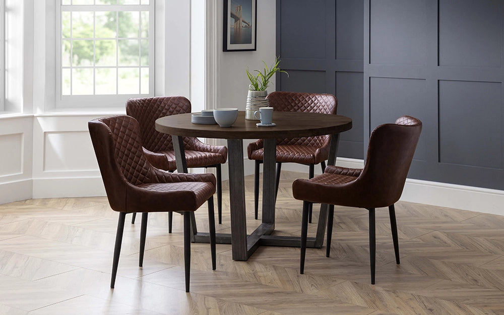 Bronx Round Dining Table in Dark Oak Finish with Padded Leather Chairs in Dining Setting