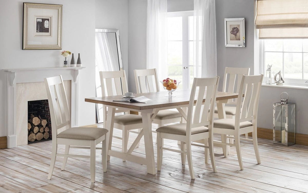 Brooklyn Dining Table in Oak Finish with Padded Wooden Chairs and Wall Frame in Dining Setting