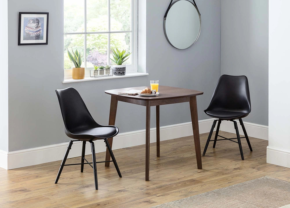 Cari Dining Chair in Black Finish with Round Mirror and Wooden Table in Breakout Setting