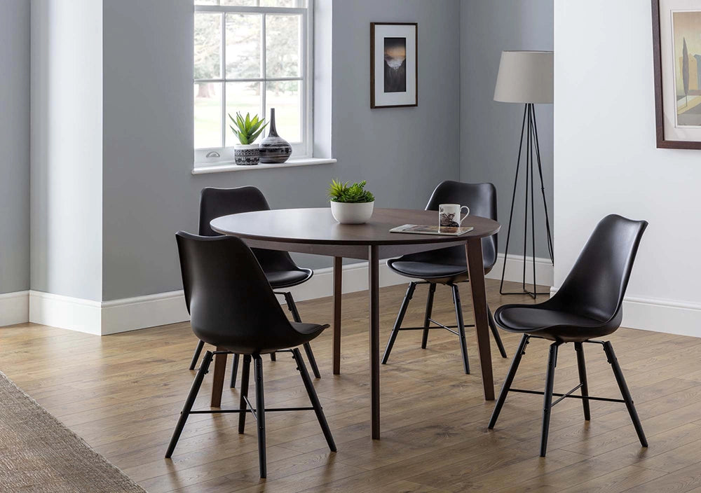 Cari Dining Chair in Black Finish with Round Table and Standing Lamp in Living Room Setting