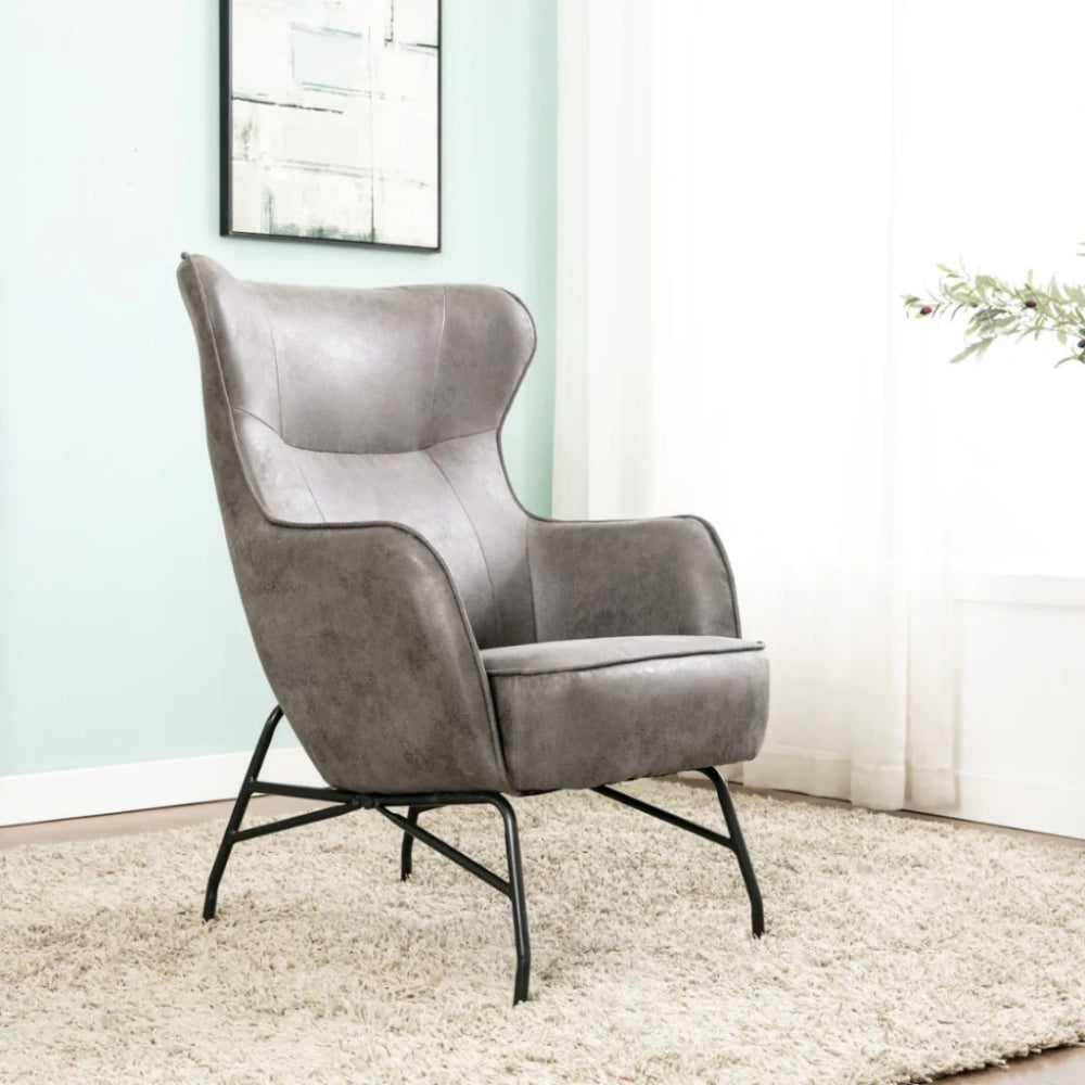 Carter High Backrest Accent Chair in Charcoal Finish with Plant and Wall Frame in Living Room Setting
