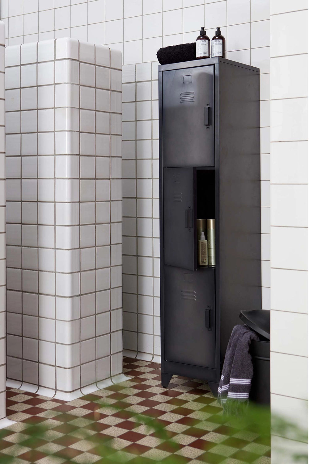 Cassidy Set of 2 Metal Lockers in - Black Finish with Shampoo Bottles and Body Towel in Bathroom Setting