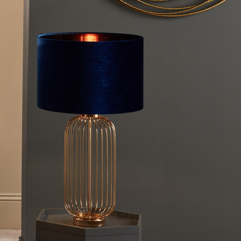 Ceiling Cyliner Shade in Sapphire Finish Put Above the Side Table in Living Room Setting