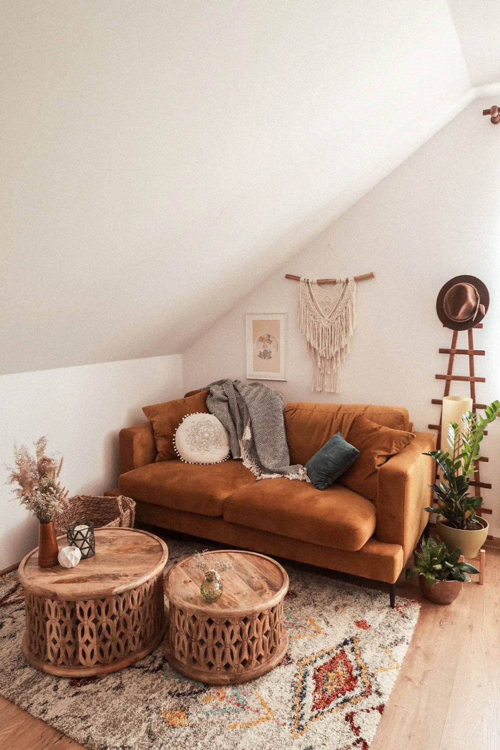 Cody 2 Seater Sofa in Mustard Finish with Indoor Plant and Coffee Table in Living Room Setting