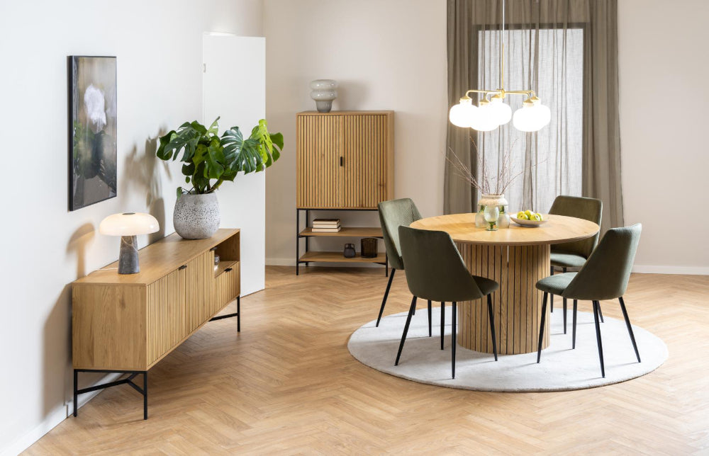 Daphne Display Cabinet with Round Table and Wooden Cupboard in Living Room Setting