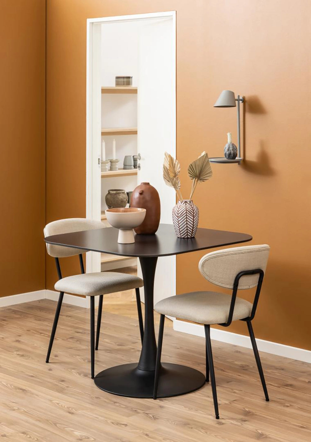 Dune Square Dining Table in Black Finish with White Chair and Wall Lampshade in Breakout Setting