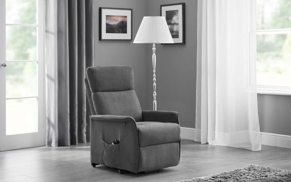 Ellie Rise and Tilt Chair in Charcoal Finish with White Standing Lamp and Wall Frame in Living Room Setting