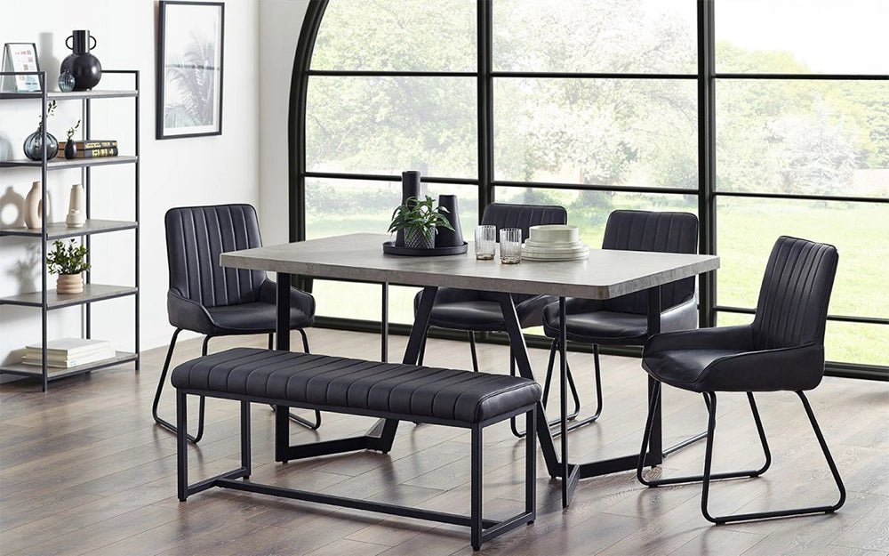 Emperor Concrete Effect Dining Table in Marble Finish with Black Dining Chairs in Dining Setting