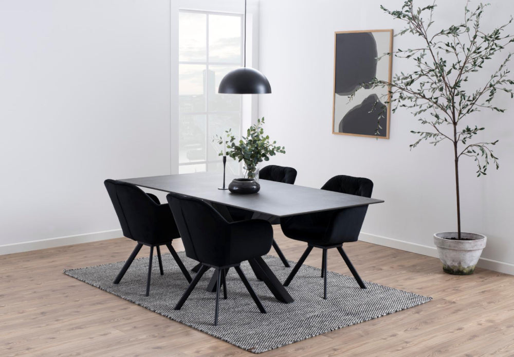 Evan Rectangular Dining Table Black with Indoor Plant and Wall Art in Dining Setting