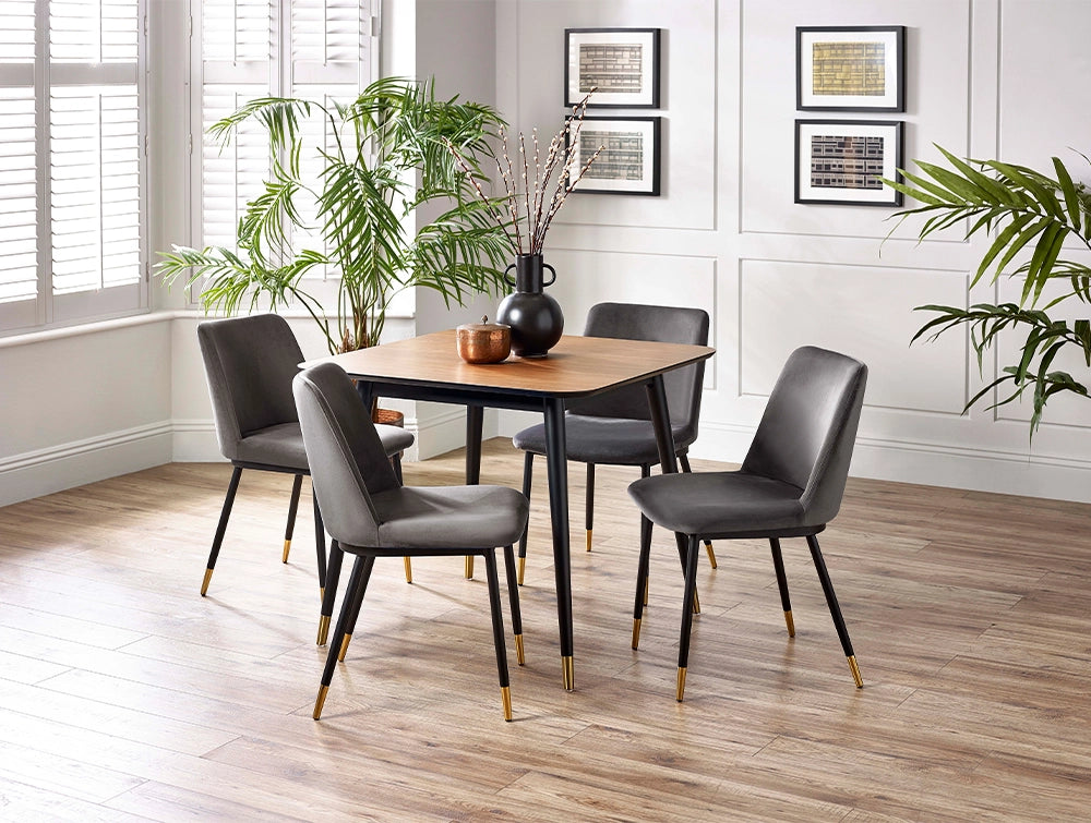 Fintan Square Dining Table in Walnut and Black Finish with Indoor Plant and Grey Chair in Dining Setting