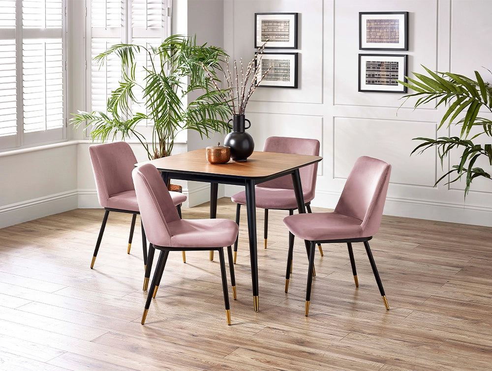 Fintan Square Dining Table in Walnut and Black Finish with Indoor Plant and Pink Chair in Dining Setting
