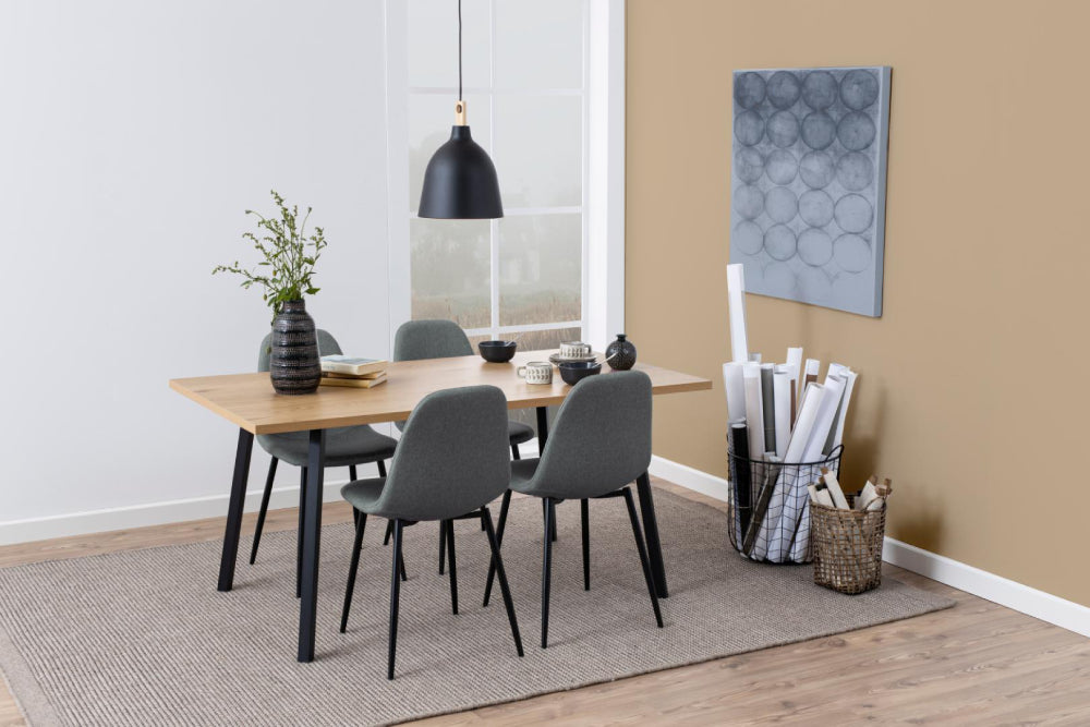 Fred Upholstered Dining Chair in Grey Finish with Dining Table and Basket in Breakout Setting
