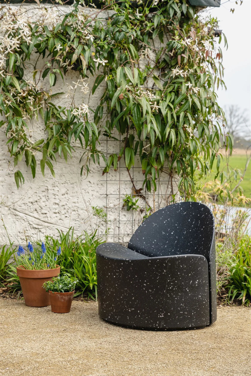 Gio Outdoor Chair Black in Outdoor Setting 2