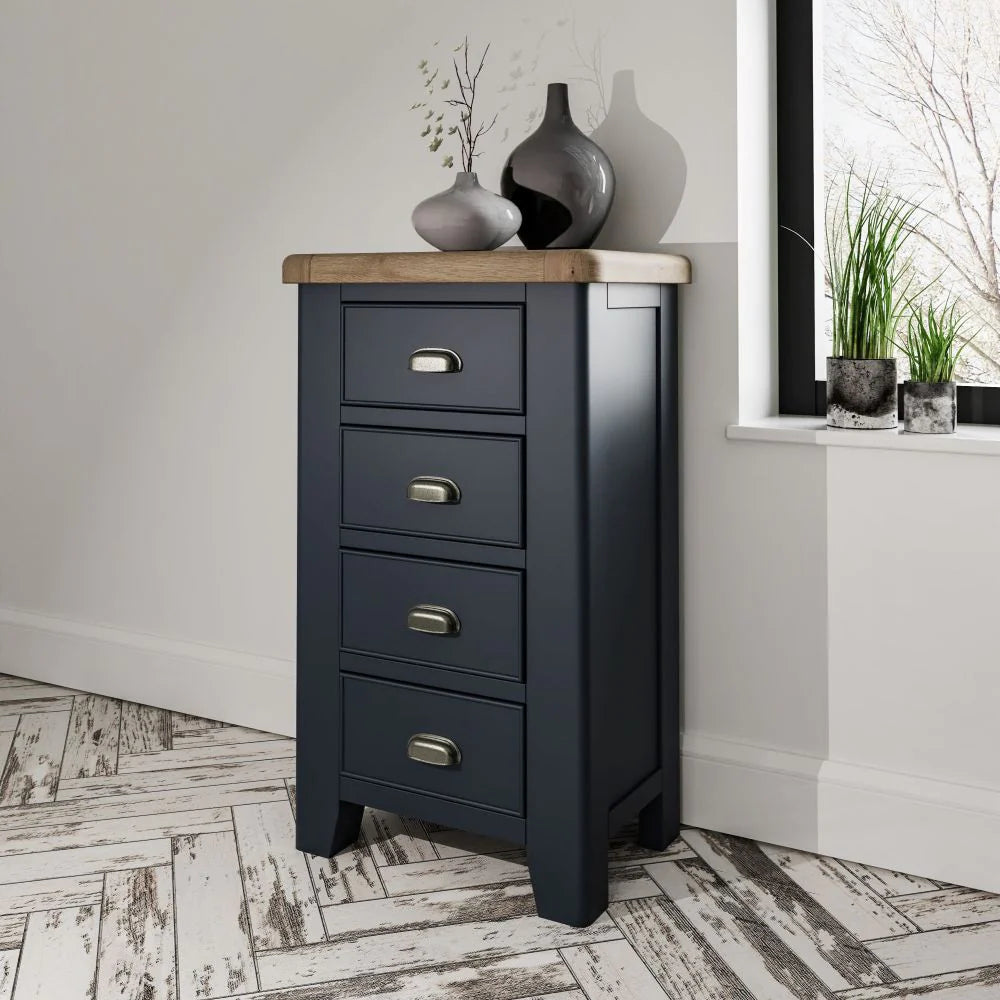 Hadley 4 Drawer Chest in Blue Finish with Flower Vase in Bedroom Setting