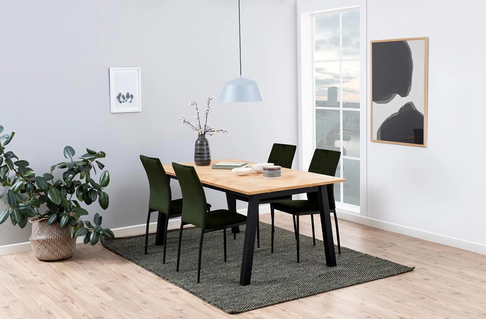 Hamilton Rectangular Dining Table in Oak Finish with Upholstered Chair and Indoor Plant in Dining Setting