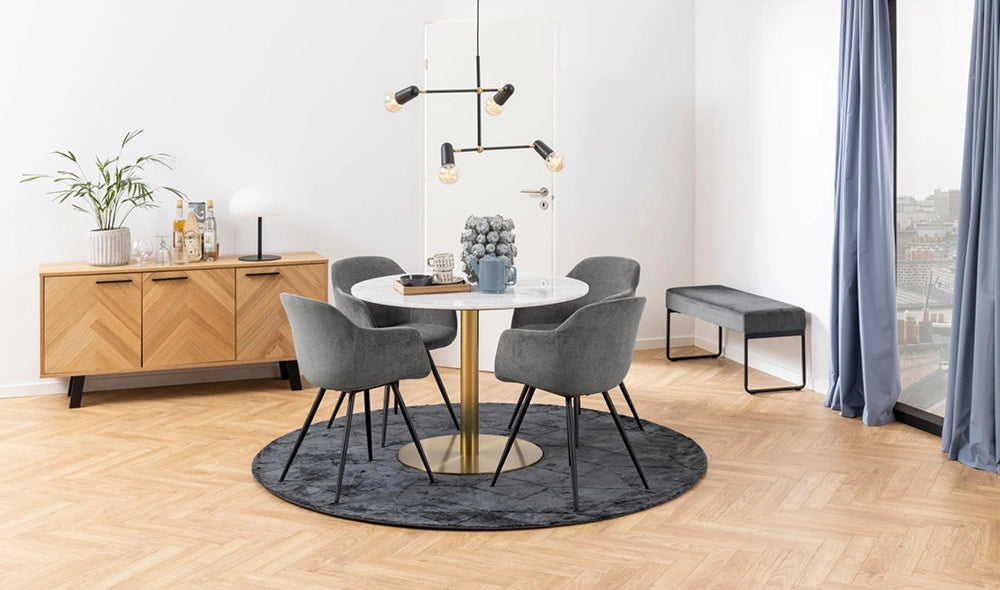 Hamilton Sideboard in Oak Finish with Round Table and Upholstered Grey Lounge Chair in Breakout Setting