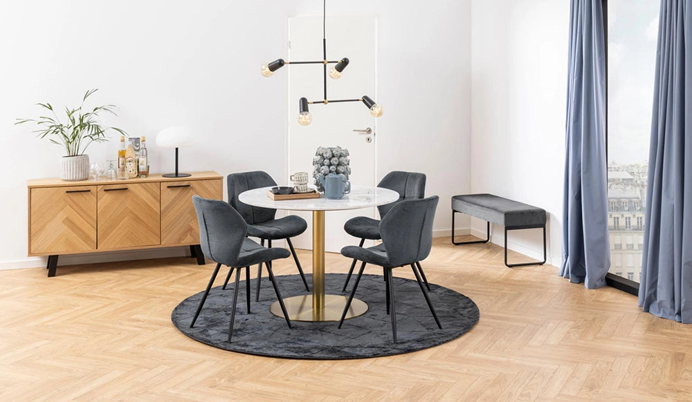 Hampton Round Dining Table in Marble Brass Finish with Upholstered Chair and Cupboard in Breakout Setting