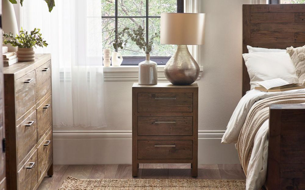 Harlow 3 Drawer Bedside Table with Lampshade and Flower Vase in Bedroom Setting