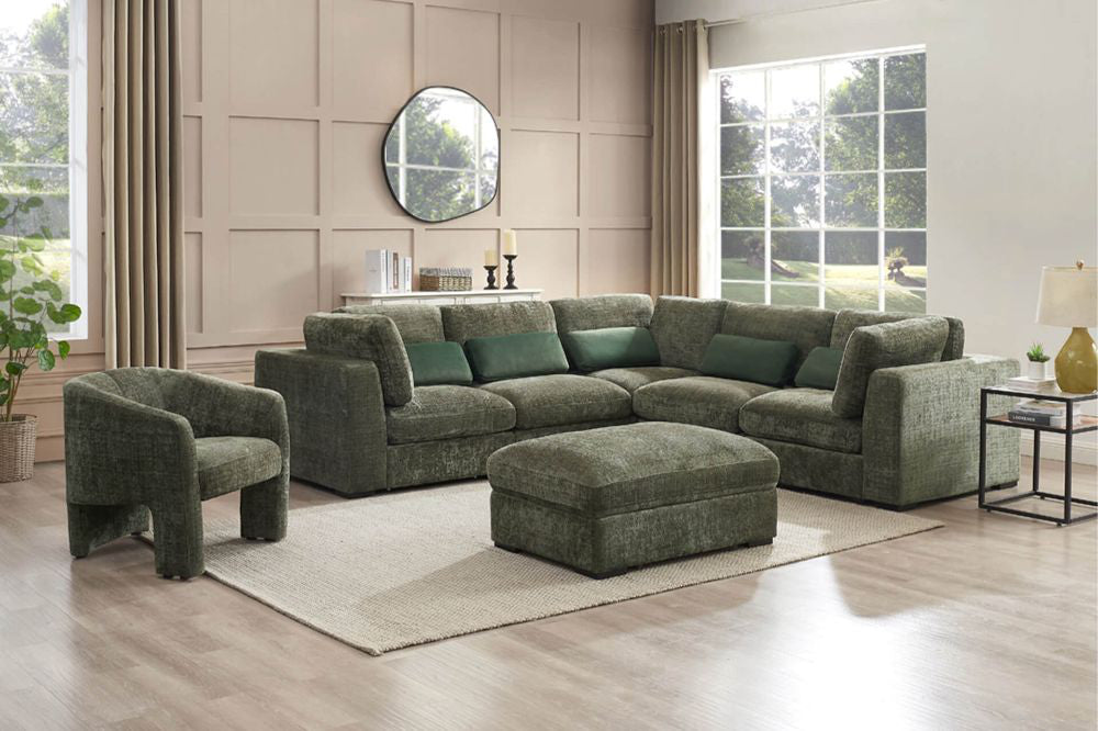 Heidi Accent Chair in Green Finish with Corner Sofa and Indoor Plant in Living Room Setting