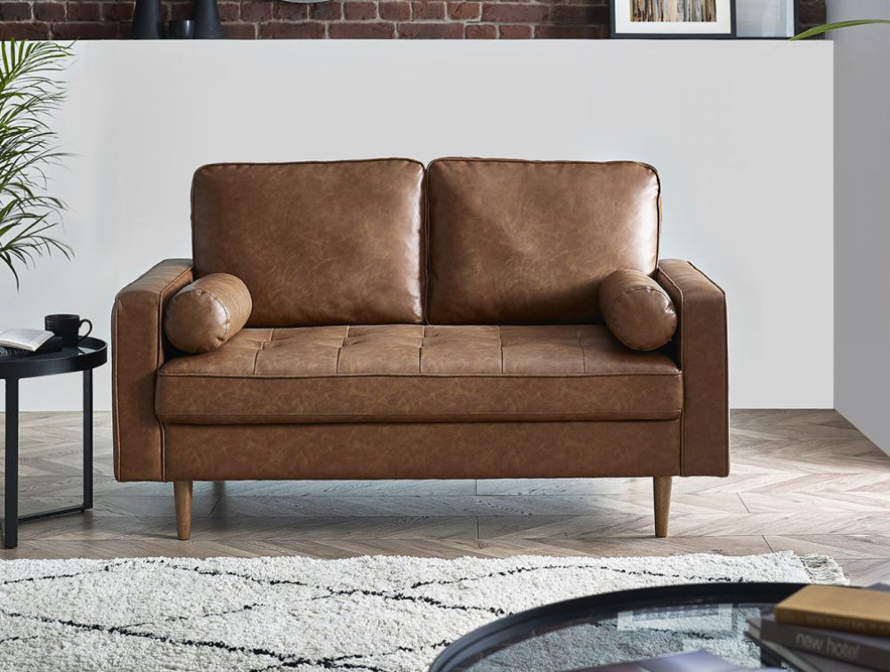 Henry 2 Seater Sofa in Brown Faux Tan Finish with Side Table and Fllor Rug in Living Room Setting