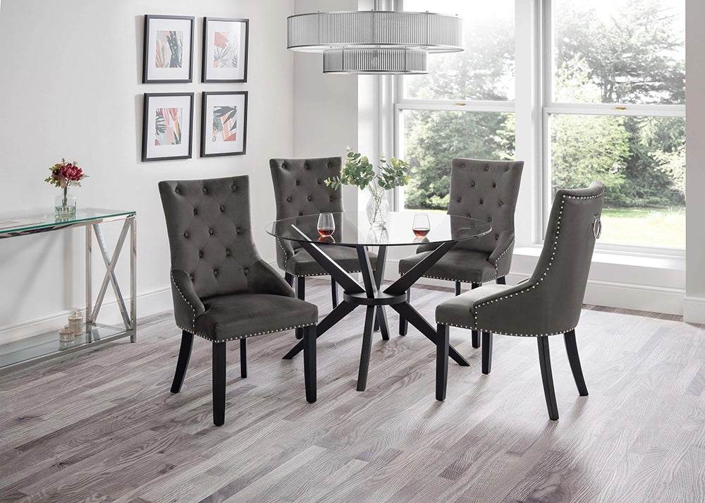 Glass dining table top with upholstered chairs