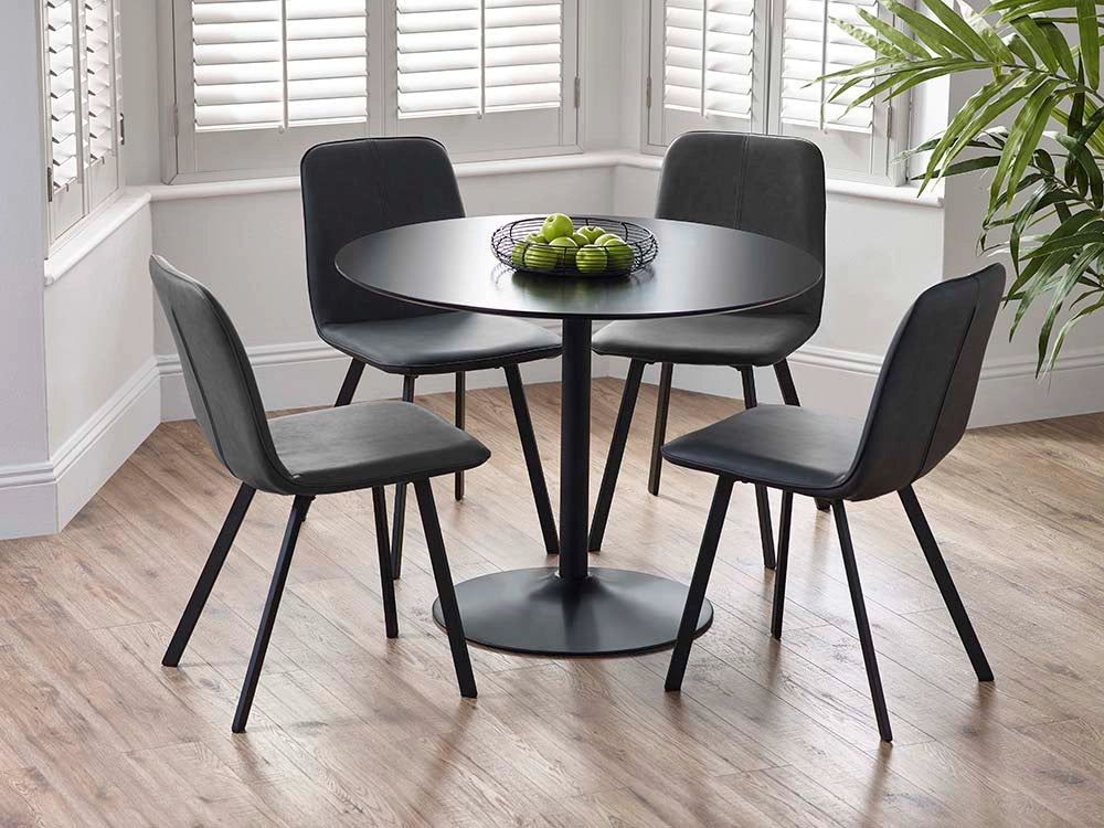 Julio Round Dining Table in Black Finish with Black Chair and Indoor Plant in Dining Setting