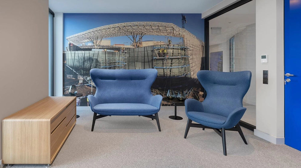 Kate Moodlii Upholstered Sofa in Blue Finish with Wooden Cupboard in Office Setting