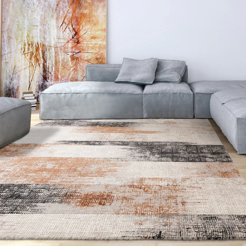 Kazzie Lines Rug in Terracotta Finish with Modular Sofa in Living Room Setting