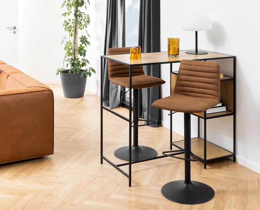 Khloe Bar Stool with Footrest in Brown Finish with Indoor Plant and Table Lamp in Living Room Setting