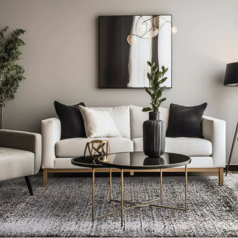 Koa Silver and Black Rug with Coffee Table and Sofa in Living Room Setting
